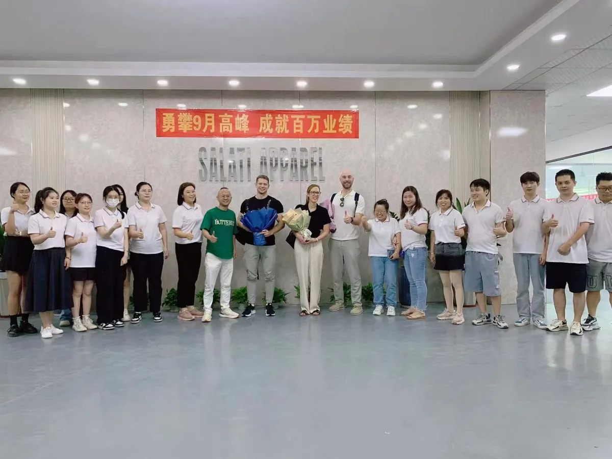 SALATI team members and visitors standing together for a group photograph