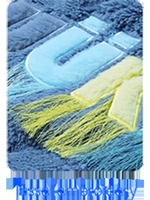 Fabric letters with fringe: Layered fabric lettering and loose threads add contrast to a textured garment surface.